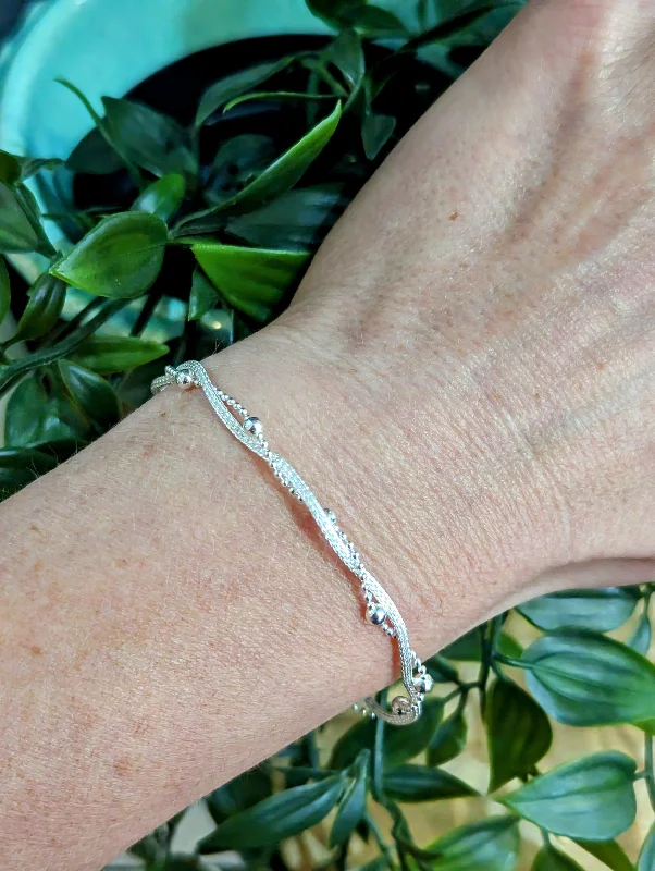 Women’s Gold Bangle Bracelet-Sterling Silver Beads in a Twist Bracelet