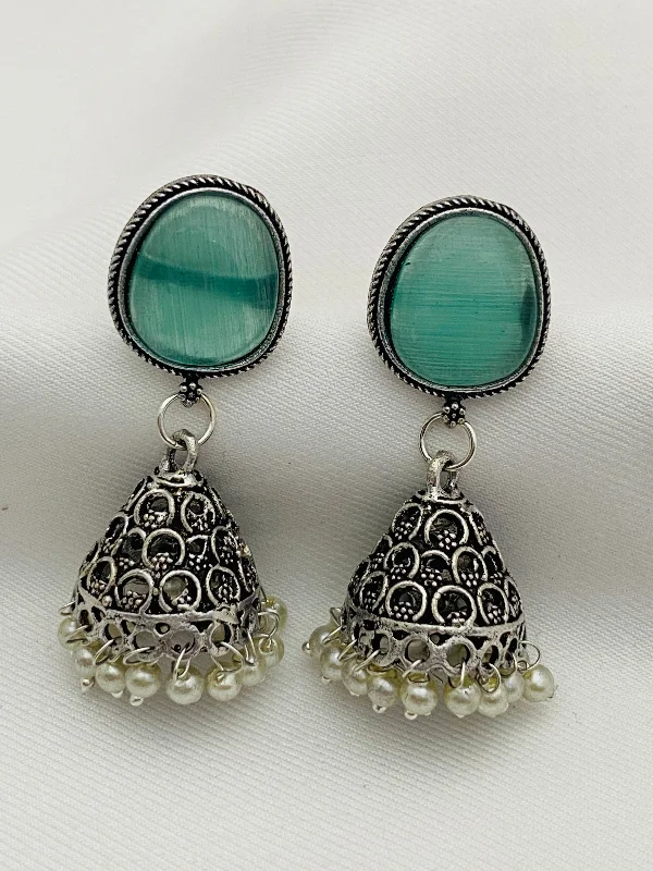 Turquoise Bead Earrings-Unique Teal Blue Stone Studded Dome Shaped Silver Plated Oxidized Jhumka Earrings With Pearl Drops