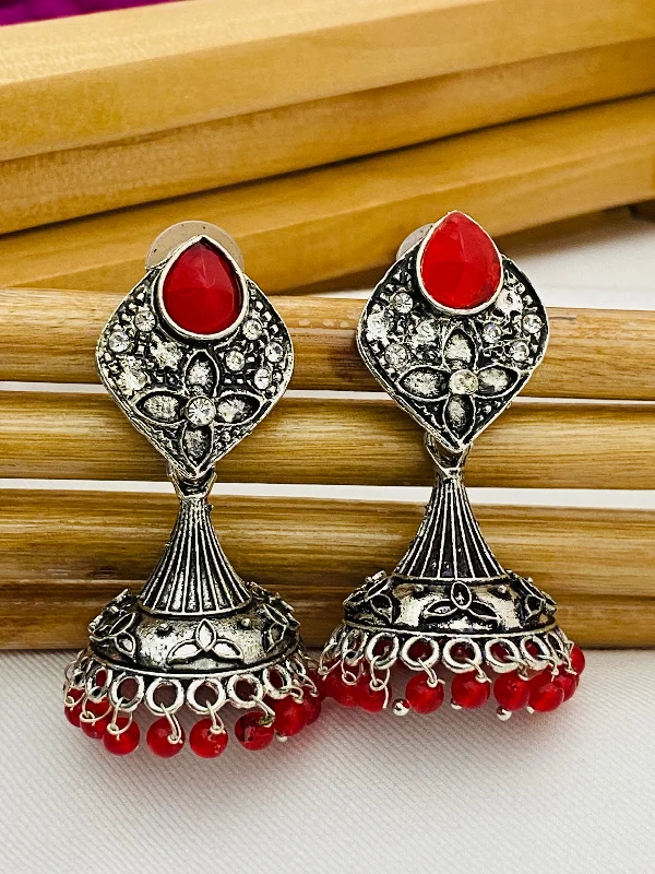 Simple Crystal Earrings-Alluring Red Stone Studded Floral Design German Silver Plated Oxidized Jhumka Earrings For Women