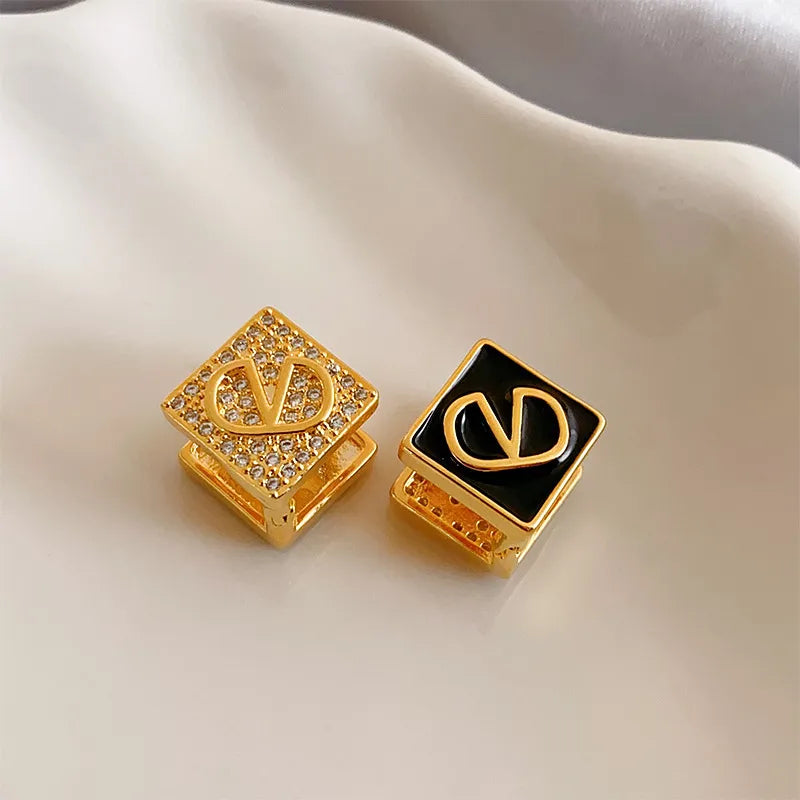 88# Ear Clip-Gold-Black Letters