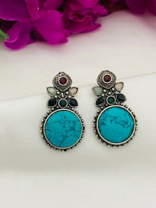 Big Gold Earrings-Stunning Turquoise Blue Stone Studded Leaf Designed Round Shaped Silver Toned Oxidized Stud Earrings