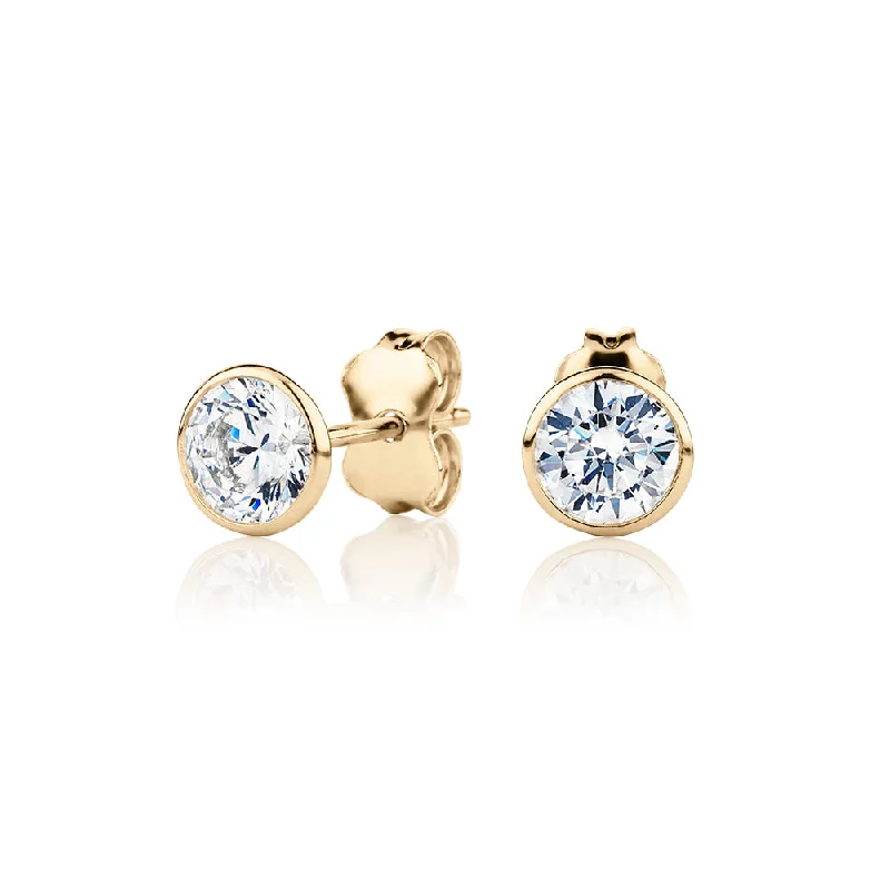 Pearl Drop Earrings-Round Brilliant stud earrings with diamond simulants in 10 carat yellow gold