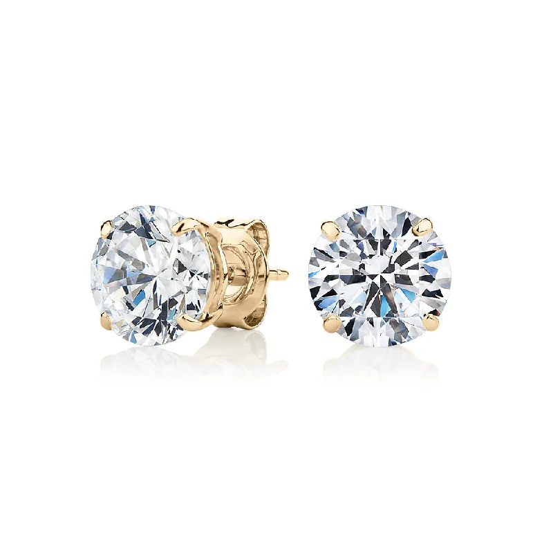 Unique Statement Earrings-Round Brilliant stud earrings with 4 carats* of diamond simulants in 10 carat yellow gold