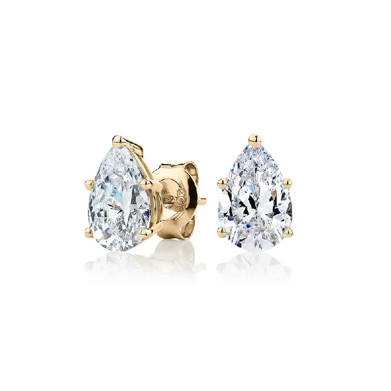 Simple Sterling Silver Earrings-Pear stud earrings with 2 carats* of diamond simulants in 10 carat yellow gold