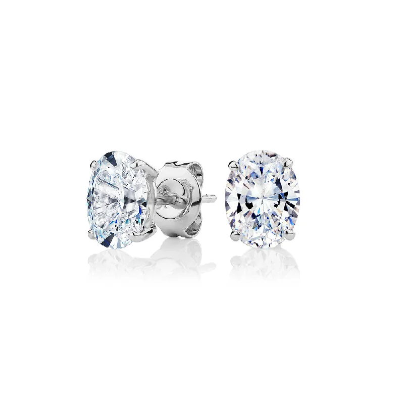 Shiny Crystal Earrings-Oval stud earrings with 2 carats* of diamond simulants in 10 carat white gold