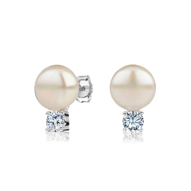 Unique Gemstone Earrings-Cultured freshwater pearl stud earrings in sterling silver