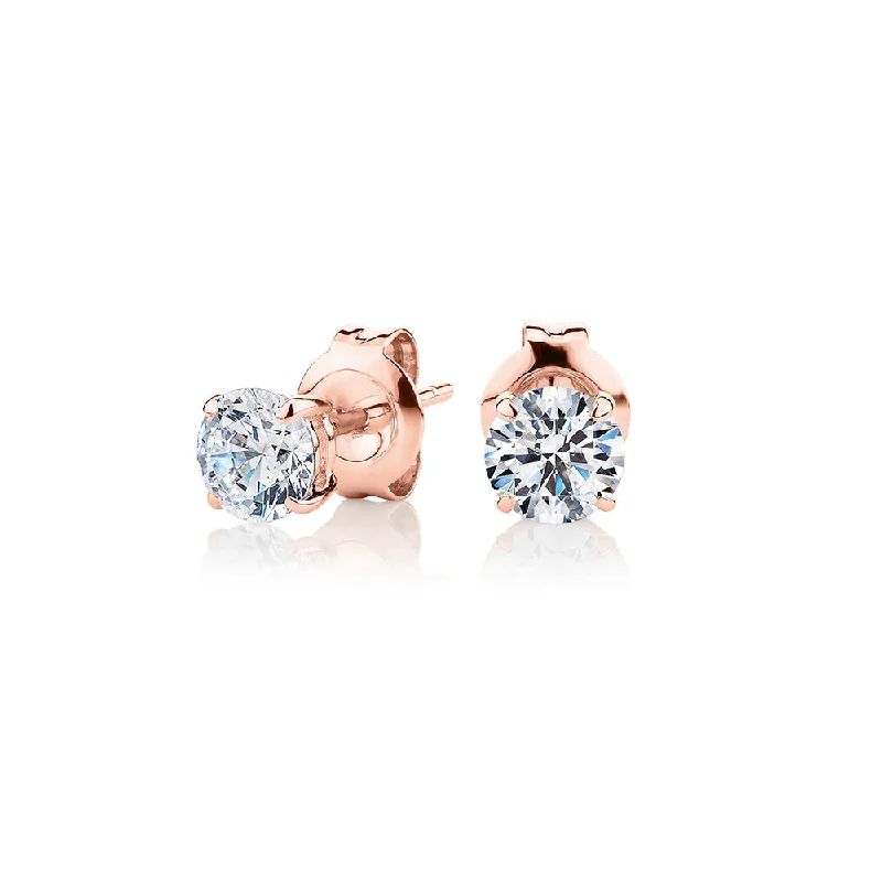 Big Gold Earrings-Round Brilliant stud earrings with 1 carat* of diamond simulants in 10 carat rose gold